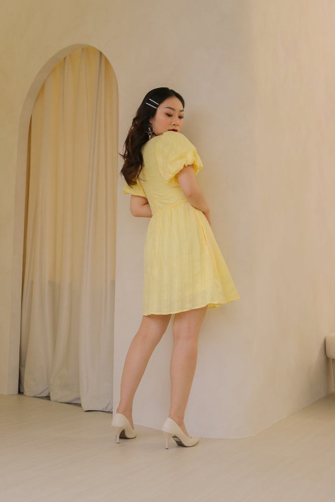 
                  
                    Load image into Gallery viewer, Melanie Babydoll Romper in Pastel Yellow
                  
                